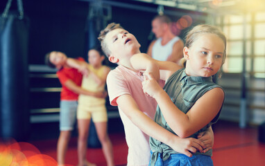 Children self defense training in the gym - obrazy, fototapety, plakaty