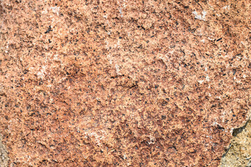 Closeup of rough textured rock as an abstract natural background
