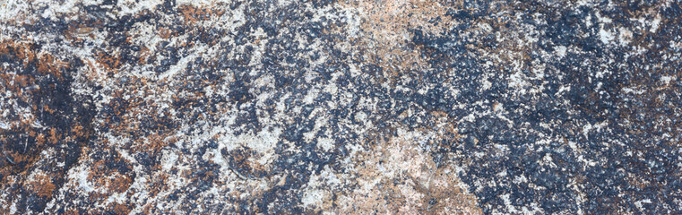 Closeup of rough textured rock as an abstract natural background
