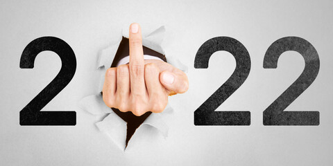 2022 numbers with hand showing middle finger