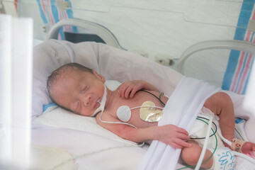 Premature newborn baby in incubator (Soft)