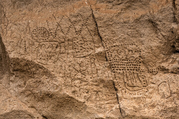 Native Modoc petroglyphs carved in stone at Petroglyph Point, Lava Beds NM