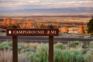 Sign pointing the way to the campground at Lava Beds National Monument - 453709297