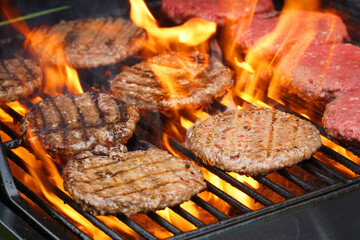 barbecue grill cooking burger steak on the fire