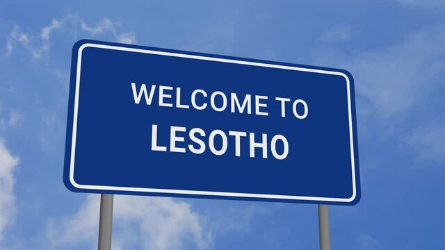 Welcome to Lesotho Road Sign on Clear Blue Sky with Rapid Moving Clouds