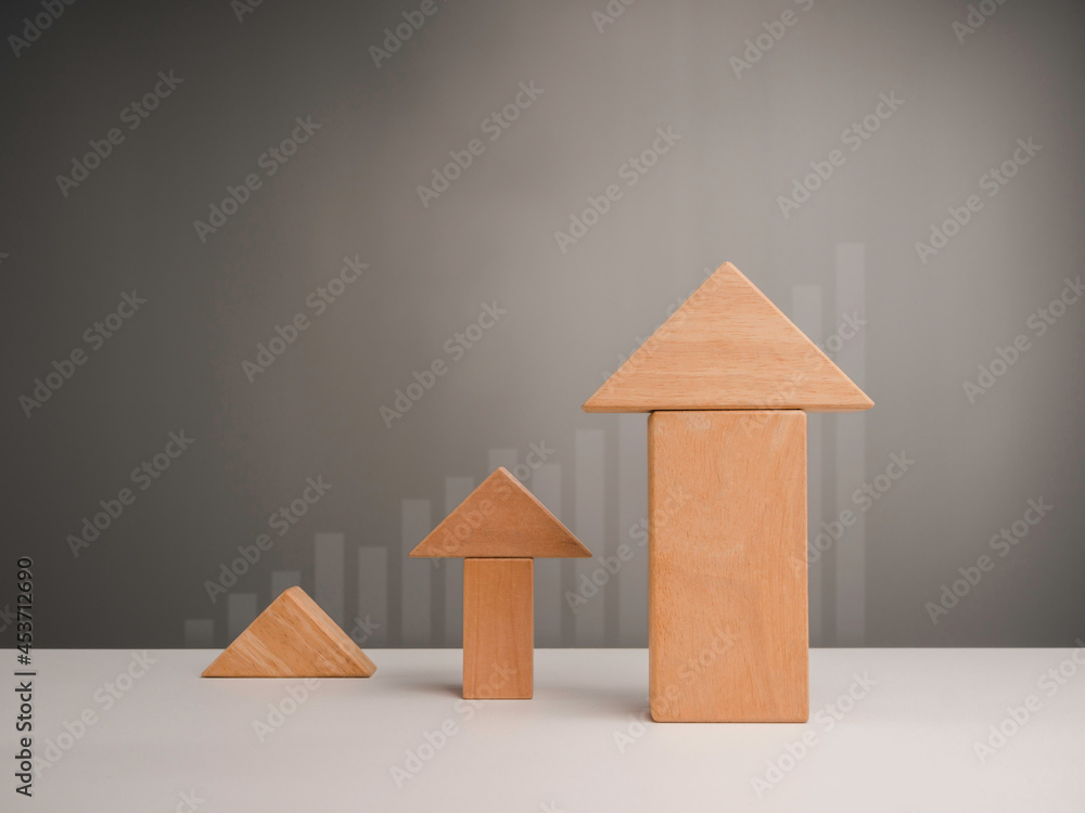 Poster business growth success concept. three size of wooden blocks stacking as arrow up averages as a grow