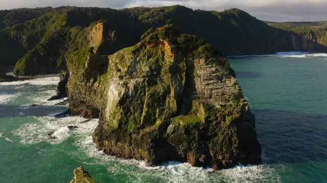 island an black rocks take video with a drone