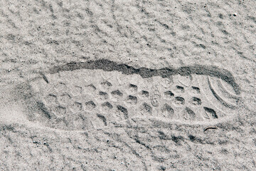 Keen Footprint on white sand