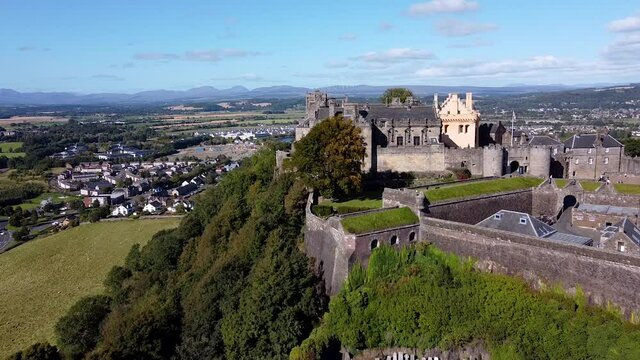 Cinematic drone shot in Stirling, Scotland . Castle and landscape.