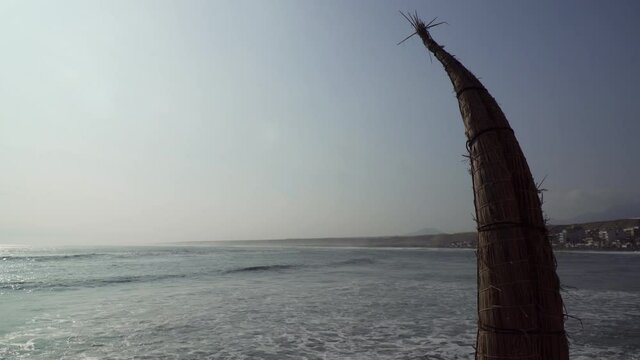 A Traditional Caballito de totora Boat Standing Along the Beach in Huanchaco, Trujillo, La Libertad, Peru