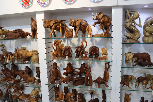 Antalya, Turkey - May 11, 2021: Wooden Gift figurs of animals at shop at Antalya, Turkey