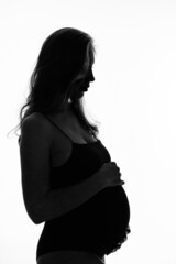 Fototapeta premium silhouette of Pregnant woman on a white background