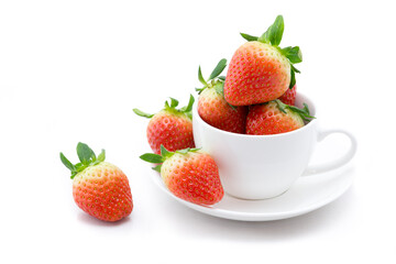 Strawberries in a coffie cup isolated on white