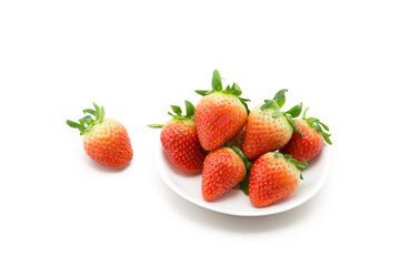 Strawberry on white plate.