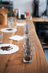 Cups filled with coffee beans for a test