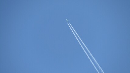 The plane is flying at high altitude over the Siberian taiga in the Russian Federation