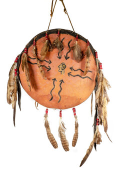 Shield of the North American Indians made of rawhide, painted and adorned with feathers