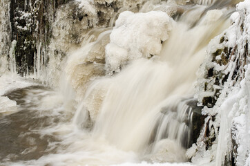 Venta waterfall, the widest waterfall in Europe, long exposure photo in winter day, Kuldiga, Latvia.