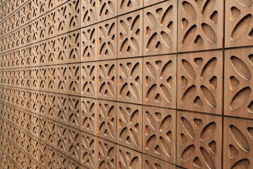 a wooden wall with a gingerbread pattern 