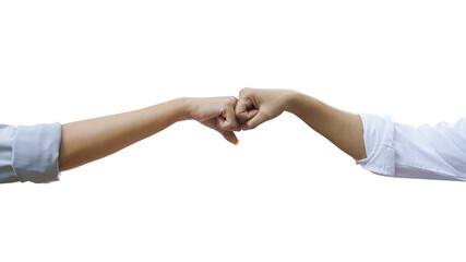 Close up image of a fist bump of women hands on white background.