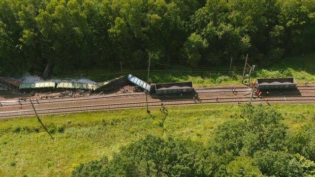 Arial view. Train accident. Rescue relief works in progress locomotive derailed
