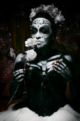 Fototapeta na wymiar Portrait of a dead woman with flower