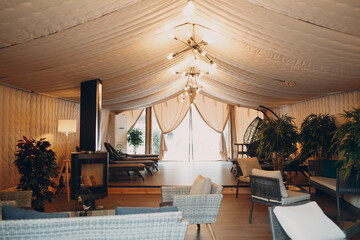 Glamping luxury camping. Glamorous camp lounge at forest