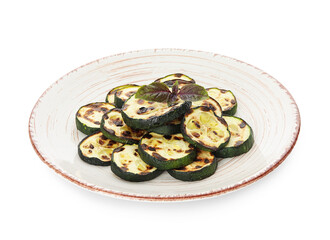 Plate with tasty grilled zucchini on white background