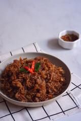 a plate of fried shredded beef  