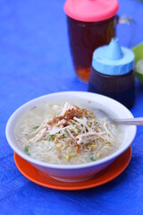 a bowl of chicken soup with rice