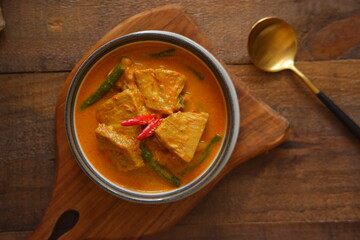 a bowl of spicy vegetable soup on the table 