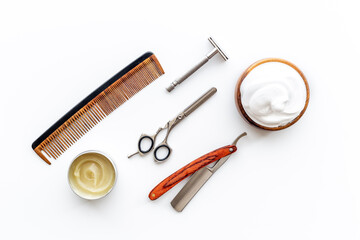 Shaving tools with barber razor and hairdressing scissors. Top view