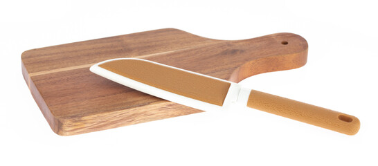 Brown knife with a brown knife sheath on wood cutting board