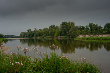 Fototapeta na wymiar Beautiful view of Ukrainian Desna river, calm waters, dramatic skies