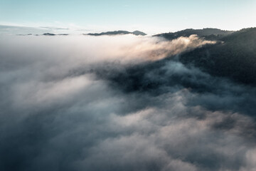 Obraz premium morning fog in the mountains rainy season