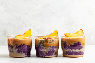 Blueberry chia pudding with caramel and peaches.