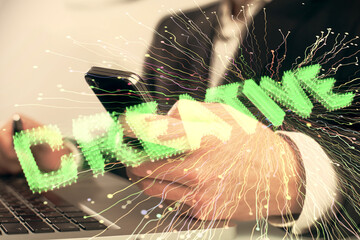 Double exposure of man's hands holding and using a mobile device and creative hologram drawing.