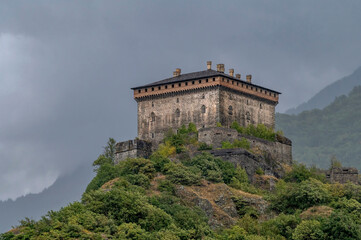 The ancient Castle of Verrès under a summer storm, Aosta Valley, Italy