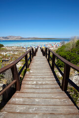 Footbridge to the beach of La Pelosa in Stintino, Sardinia, Italy