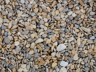 Small stone texture on the beach.