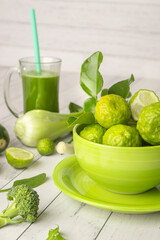 Green vegetables on white wooden background, healthy lifestyle, vegetarian eating