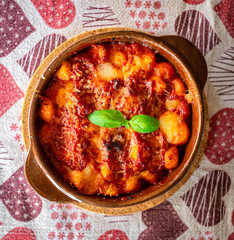 Gnocchi alla Sorrentina, Italian Potato Dumplings in Tomato Sauce, Gratinated With Mozzarella...