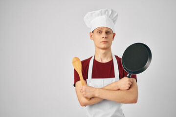male chef Frying pan in hands kitchen cooking professional