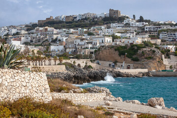 Fototapeta na wymiar Castro marina, Lecce. Panorama costiero del Borgo con spiaggia e castello
