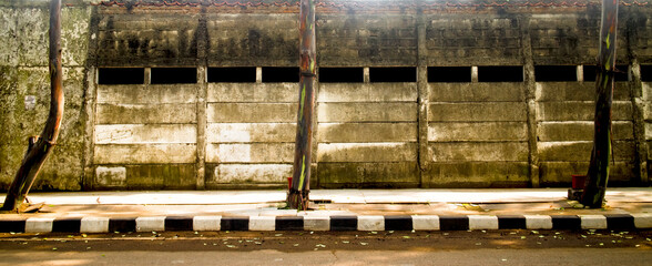 concrete wall, started to covered in moss.