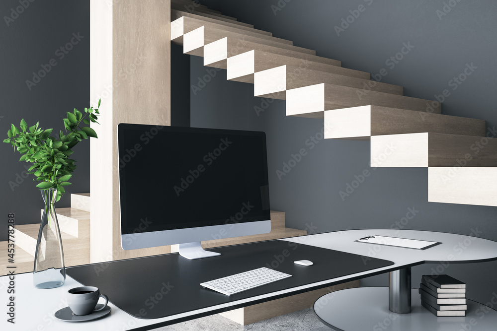 Poster Close up of creative designer desktop with empty computer display, decorative items and modern interior in the background. Mock up, 3D Rendering.