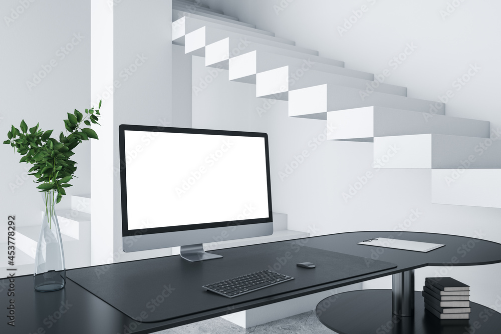 Aufkleber Close up of creative designer desktop with empty white computer screen frame, decorative items and modern interior in the background. Mock up, 3D Rendering.