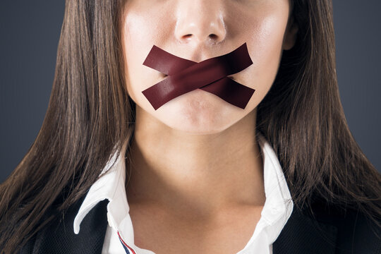 Close Up Of Taped European Businesswoman Mouth. Silence And Speech Censorship Concept.