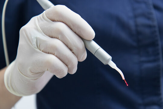 Close up on a surgical micro laser scalpel blade
