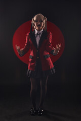 Cosplayer girl on a black background in a red circle